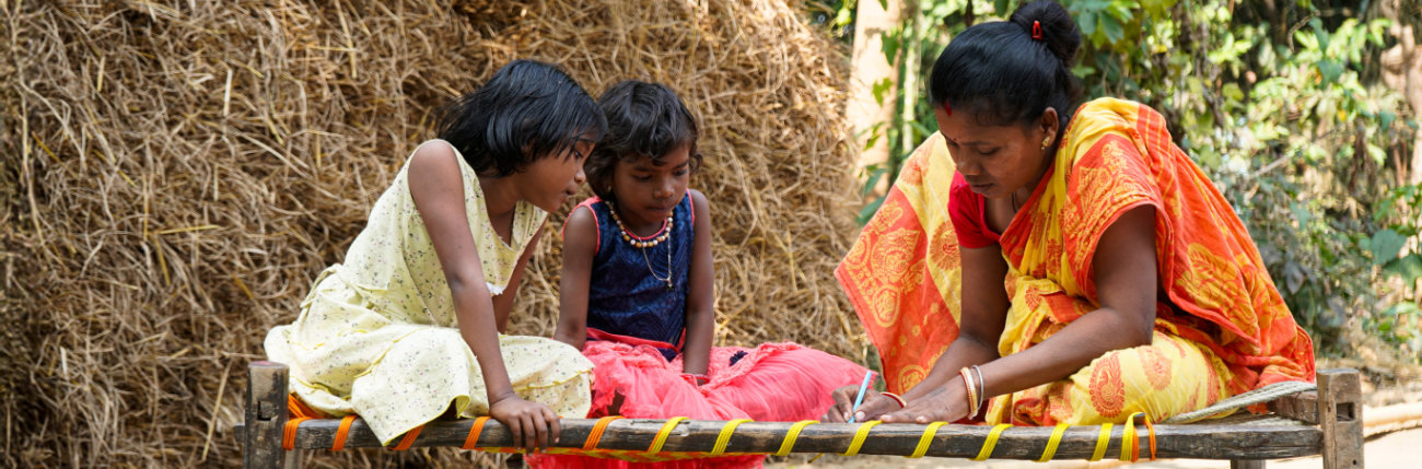 Indische Frau mit Kindern